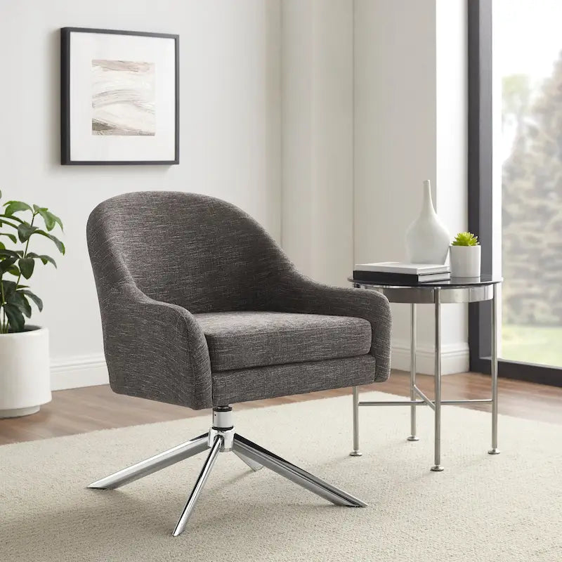 Sillón decorativo giratorio tapizado con base cromada