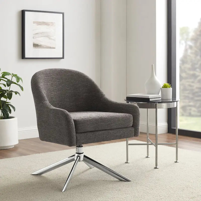 Sillón decorativo giratorio tapizado con base cromada